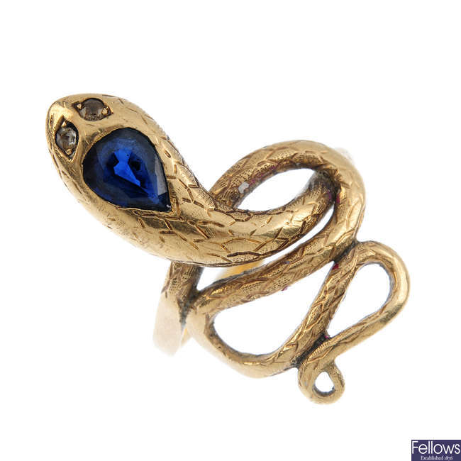 A sapphire and gem-set snake ring.