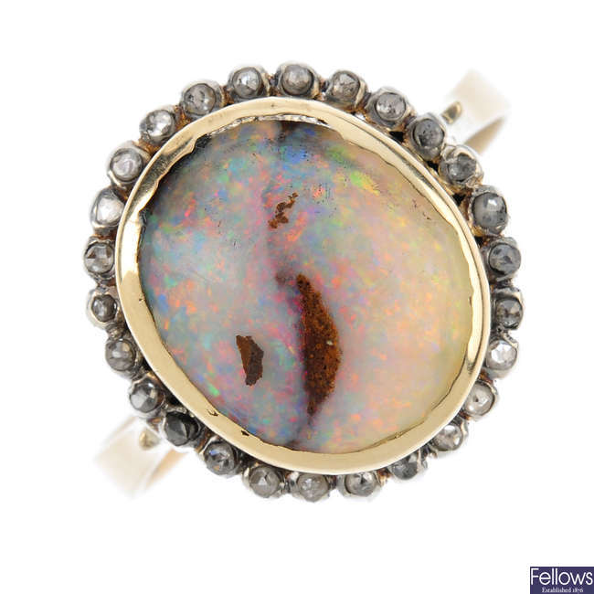 A boulder opal and diamond cluster ring.