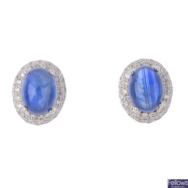 A pair of 18ct gold sapphire and diamond cluster earrings.