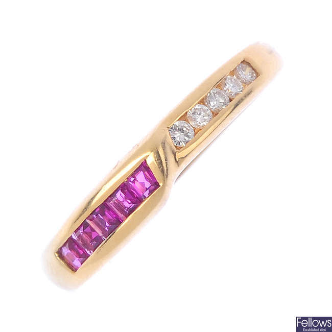 A 14ct gold ruby and diamond half-circle eternity ring.