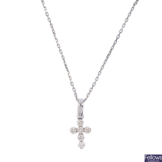A diamond cross pendant, with chain.