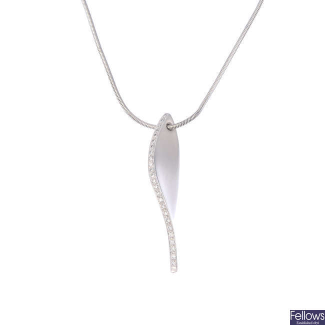 An 18ct gold diamond pendant, with chain,