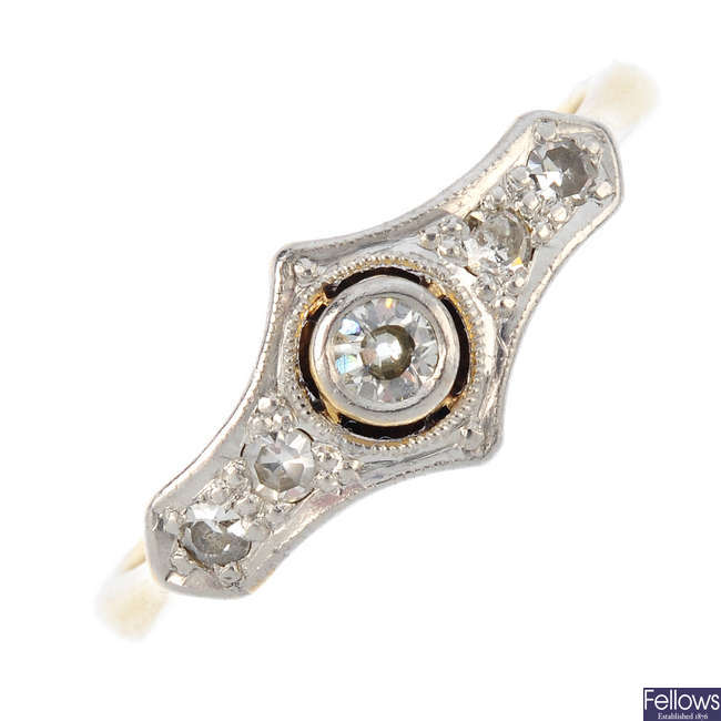 An Art Deco platinum and 18ct gold diamond dress ring.