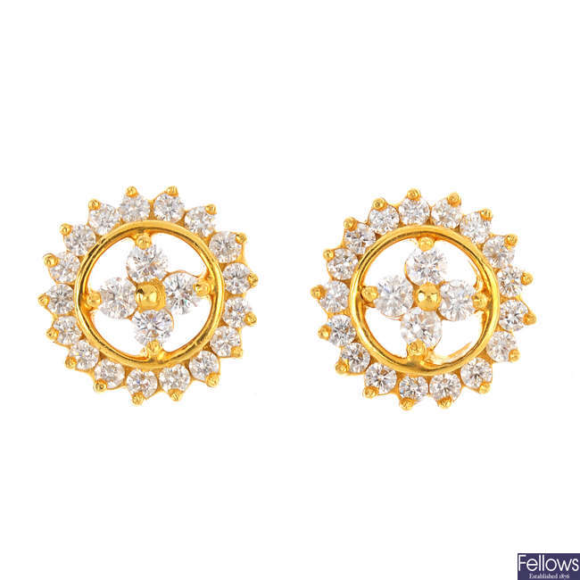 A pair of diamond cluster earrings. 