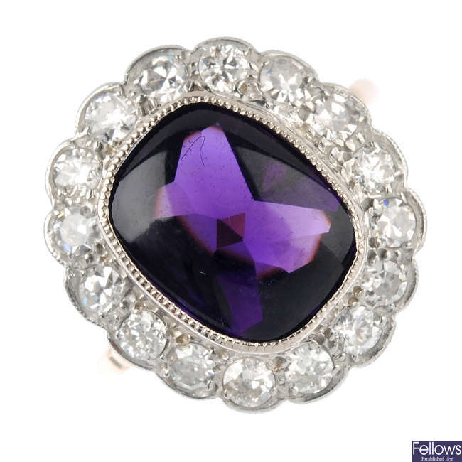 An amethyst and diamond cluster ring. 