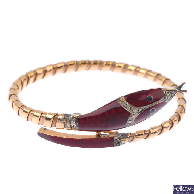 A mid 20th century gold enamel snake bangle.