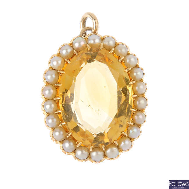 An early 20th century citrine and split pearl gold pendant.