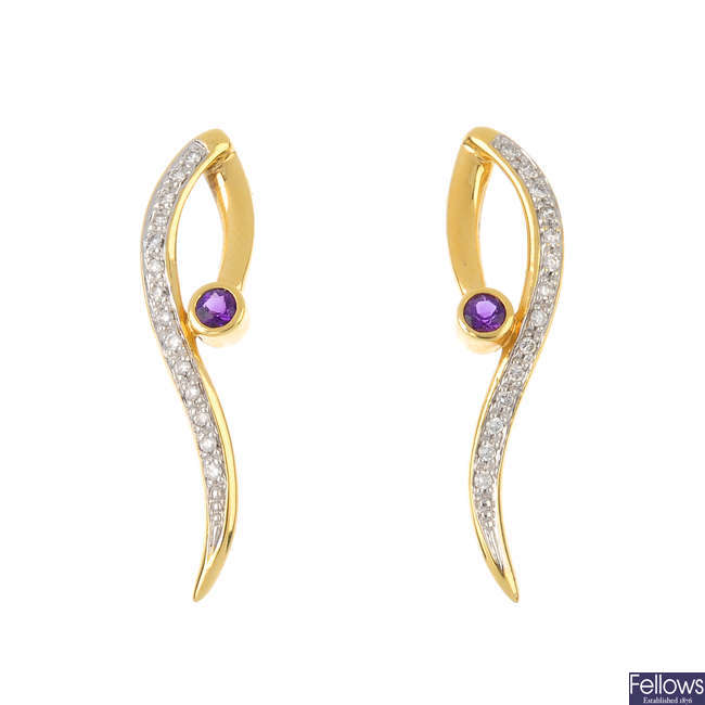 A pair of 18ct gold amethyst and diamond earrings.