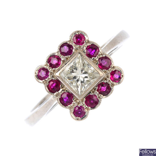 An 18ct gold diamond and ruby cluster ring.