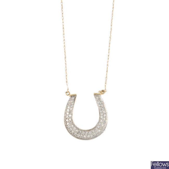 A 9ct gold diamond pendant, on chain.