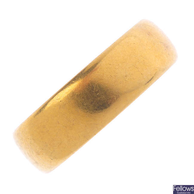 A late Victorian 22ct gold band ring.