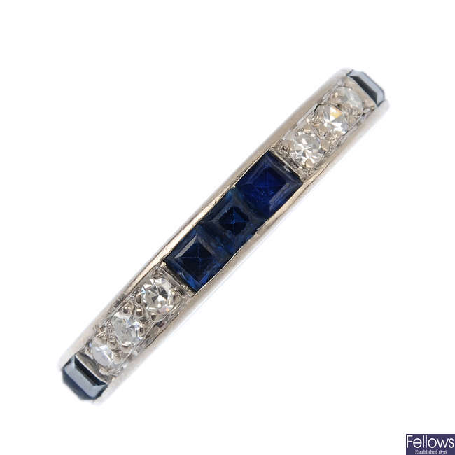 A diamond and sapphire full-circle eternity ring.