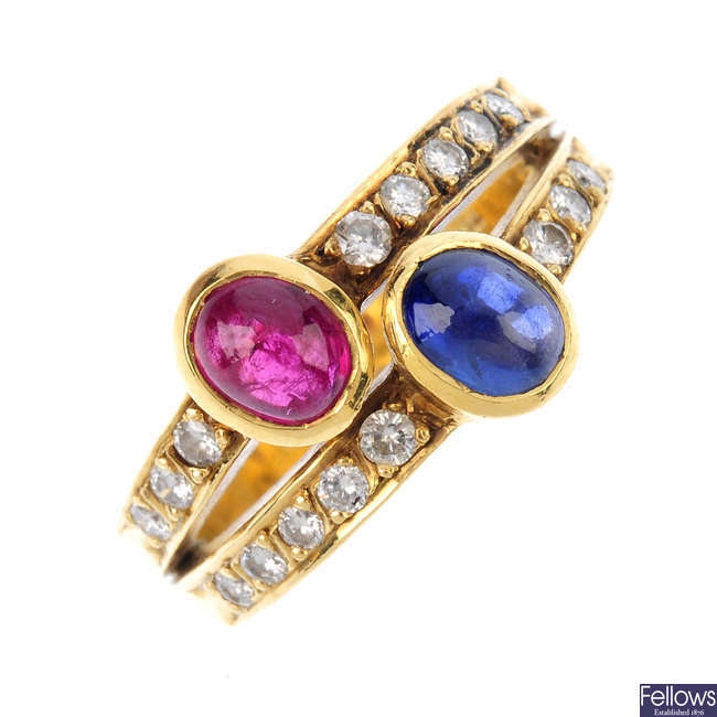 A sapphire, ruby and diamond band ring.