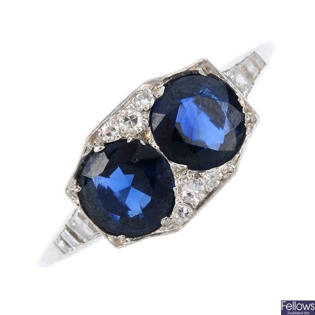 An Art Deco platinum sapphire and diamond dress ring.