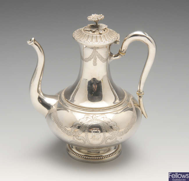 A small French silver coffee pot.