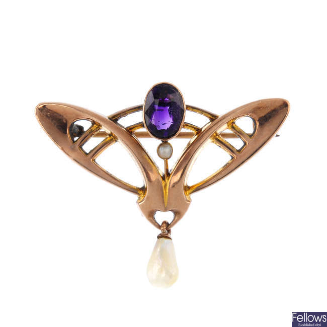 An Art Nouveau 9ct gold amethyst and pearl brooch.