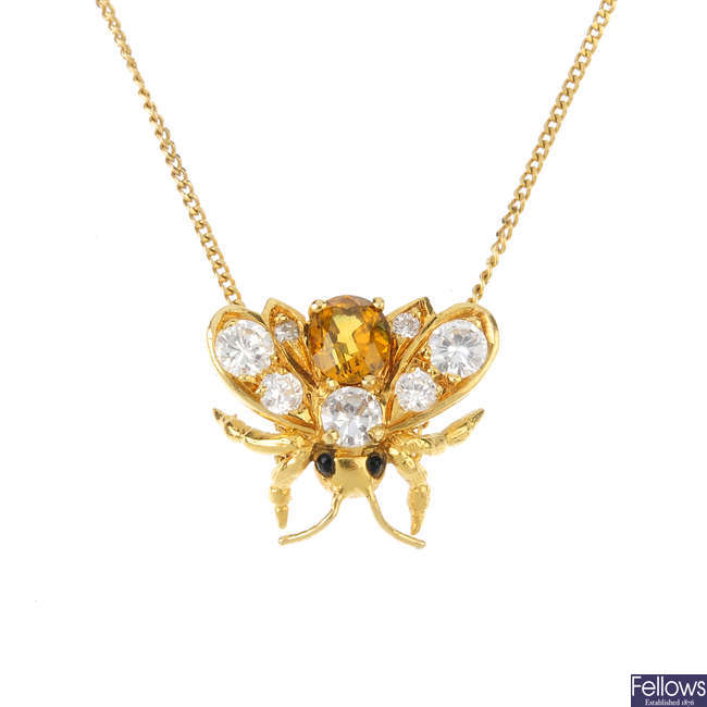 A chrysoberyl and diamond insect necklace.