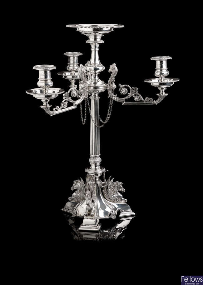 A Victorian silver three-branch table candelabrum.