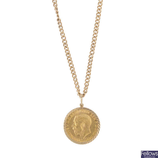 A sovereign pendant, with chain.