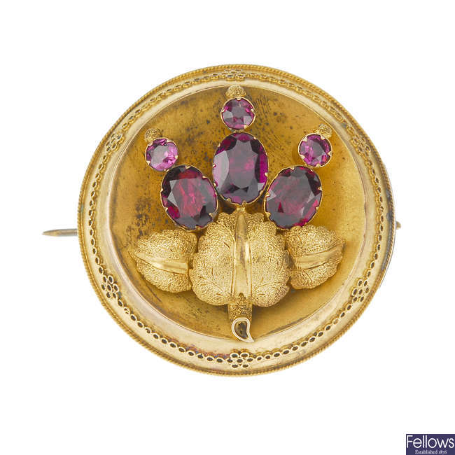 A late 19th century gold and garnet memorial brooch.