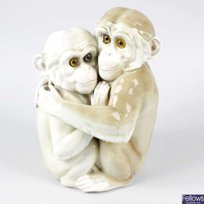 A Continental porcelain monkey group.