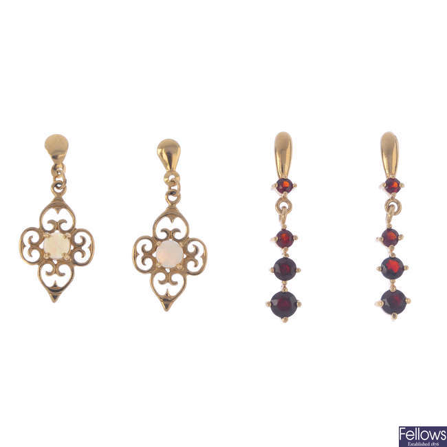 Five pairs of diamond and gem-set earrings.
