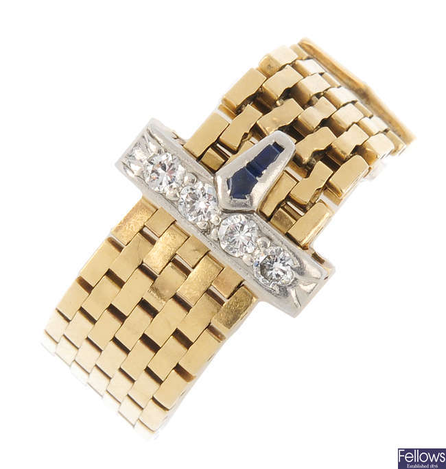 A mid 20th century diamond and gem-set adjustable buckle ring.