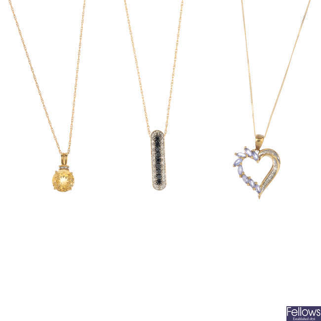 Three gem-set pendants and chains.