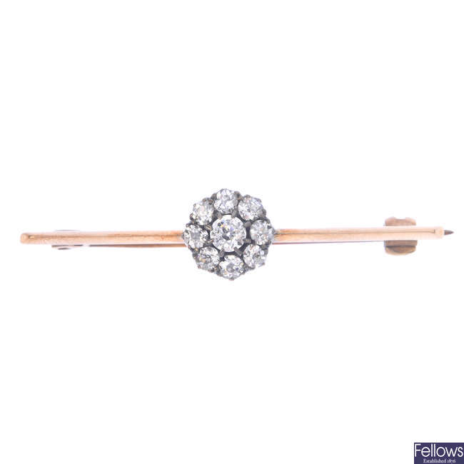 An early 20th century diamond cluster bar brooch.