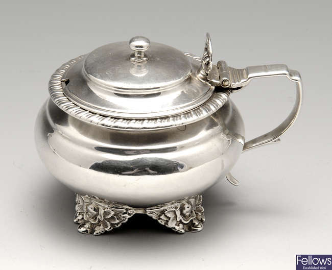 A George IV silver mustard pot.