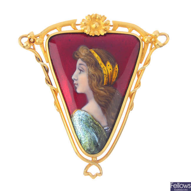 An Art Nouveau gold and enamel pendant.