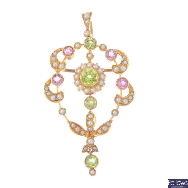 An early 20th century 15ct gold peridot, tourmaline and split pearl pendant.