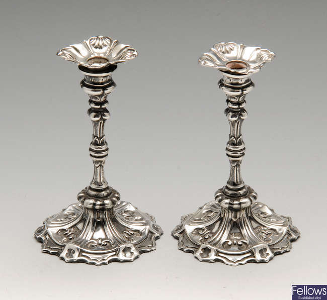 A pair of Edwardian silver tapersticks.