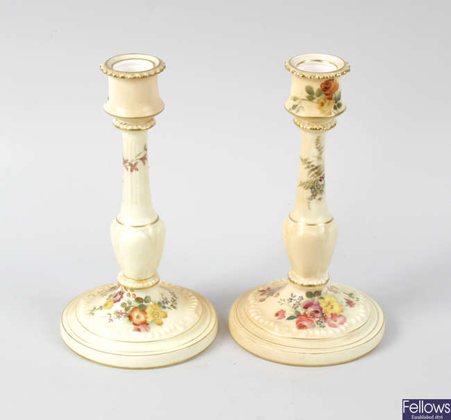A pair of Royal Worcester candle sticks, Locke & Co. Worcester planters and antique jug.