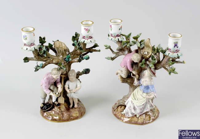 A group of six German porcelain figural candlesticks