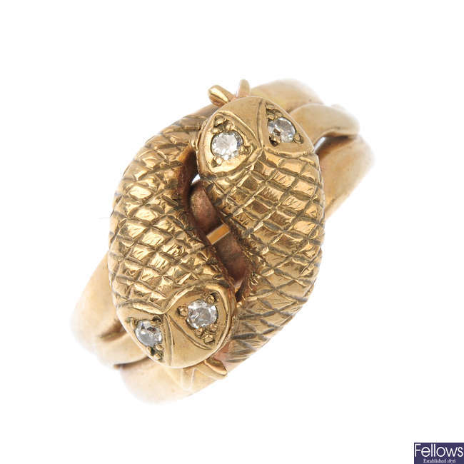 A 1970s 9ct gold diamond snake ring.