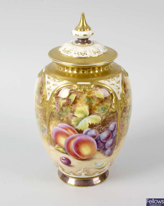 A Royal Worcester porcelain fruit-painted vase and cover by Henry