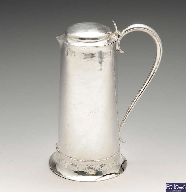 An Arts & Crafts small silver flagon by the Guild of Handicraft.