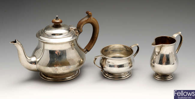 An early twentieth century composite silver three piece tea service.