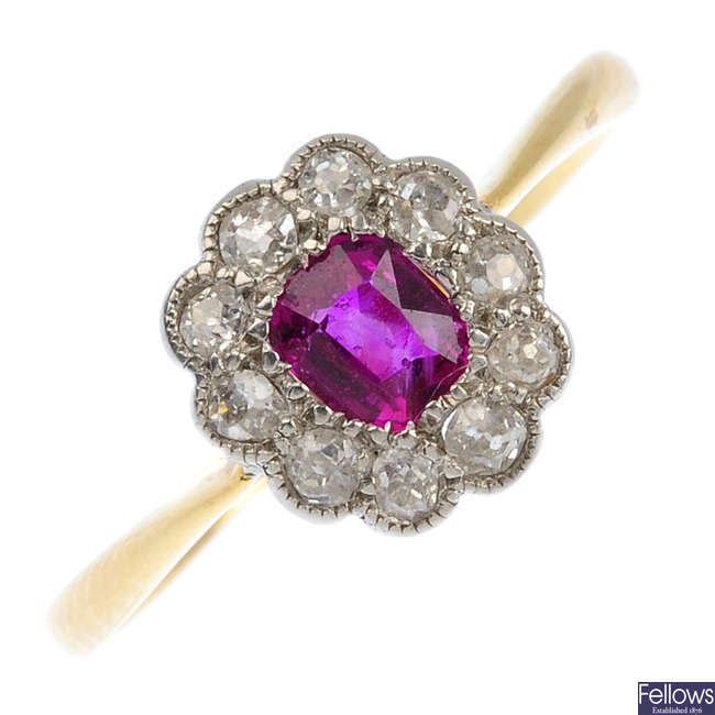 A mid 20th century 18ct gold ruby and diamond cluster ring.