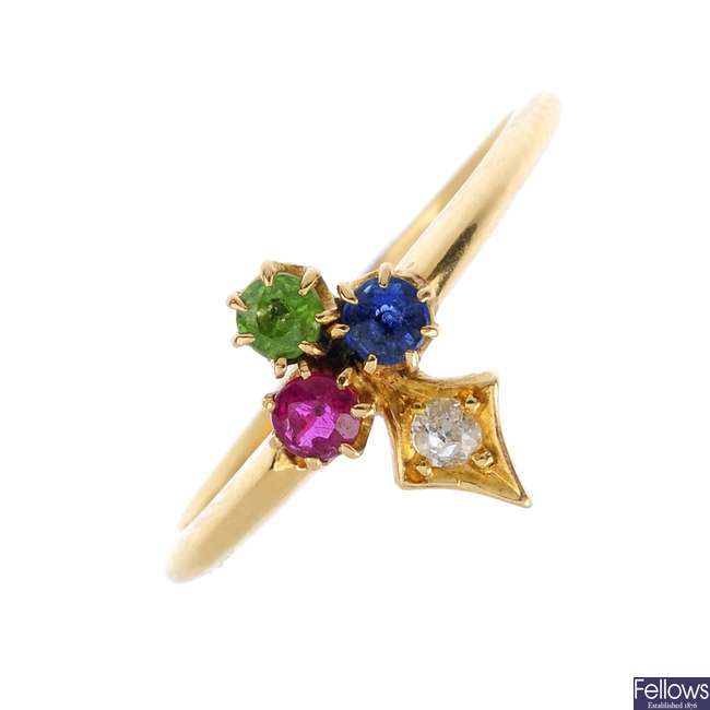 An early 20th century gold diamond and gem-set dress ring.