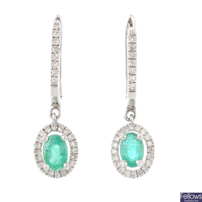A pair of 9ct gold emerald and diamond earrings.