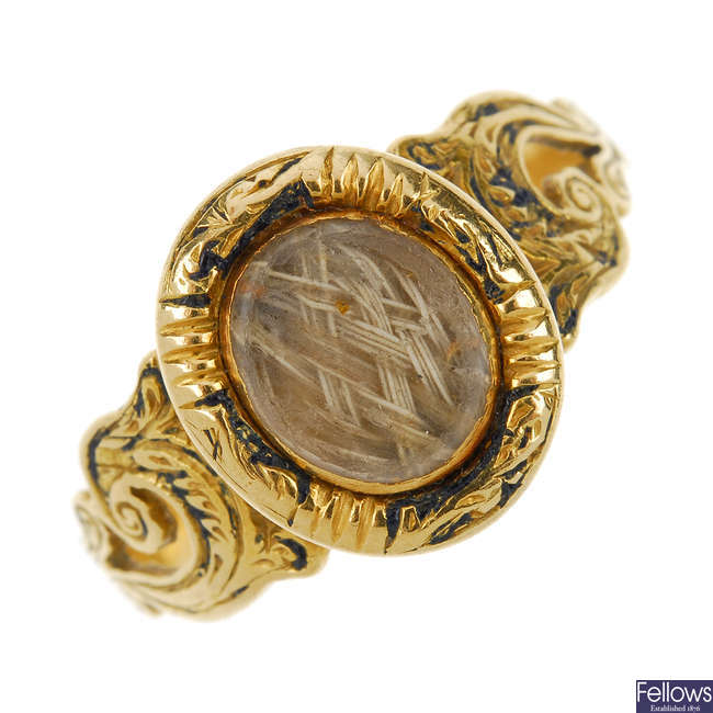 A mid Victorian 18ct gold memorial ring.