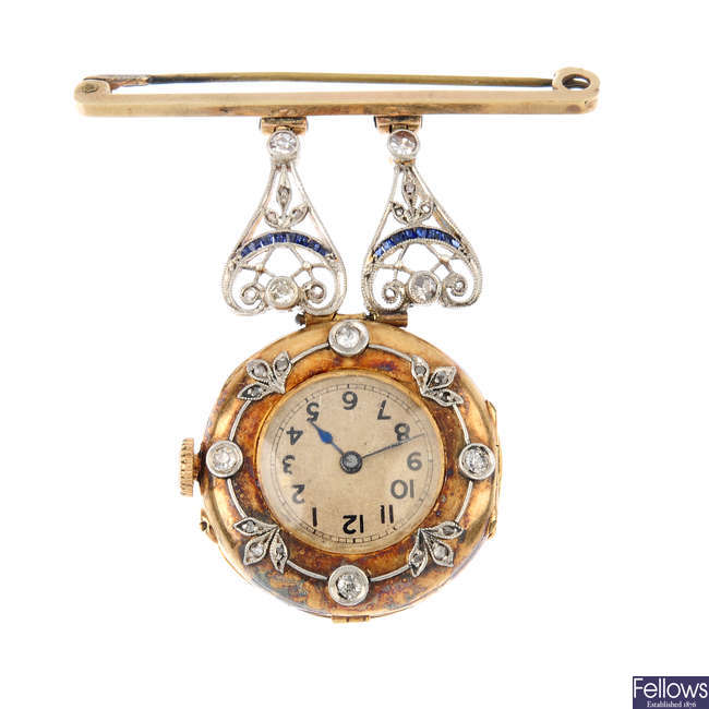A gold, diamond and sapphire fob watch.