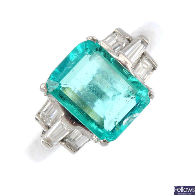 A Colombian emerald and diamond ring.