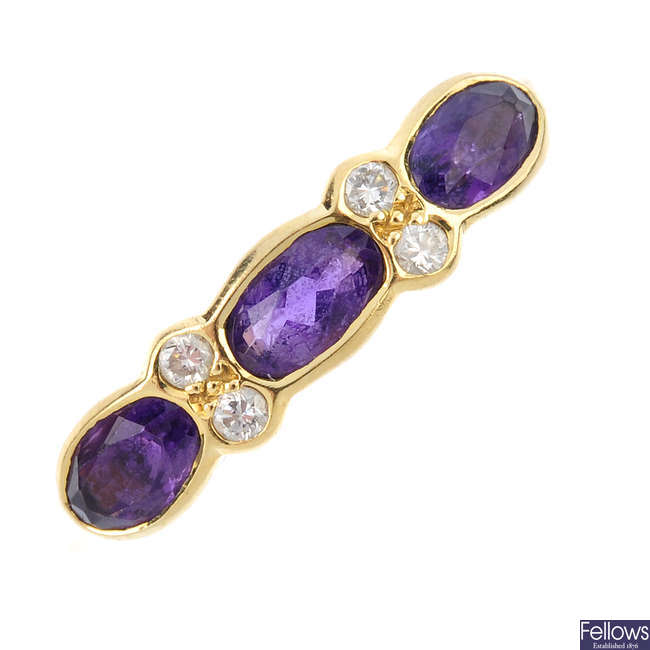 An 18ct gold amethyst and diamond ring.