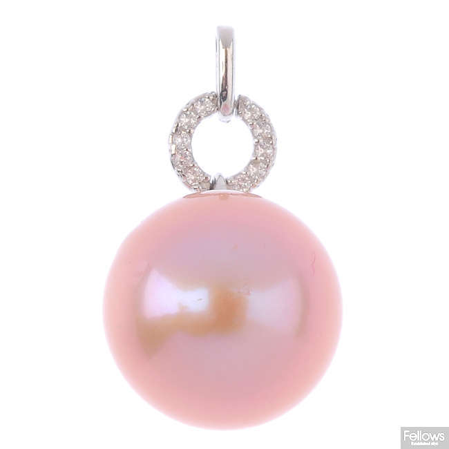 A South Sea dyed cultured pearl and cubic zirconia pendant.
