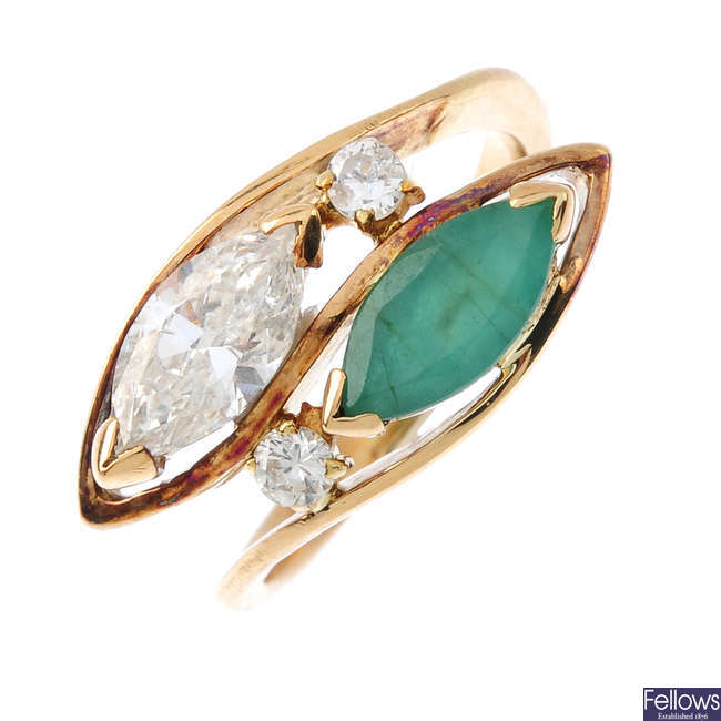 A 1970s 14ct gold diamond and emerald crossover ring.