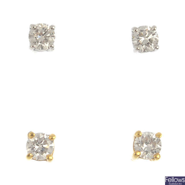 Four pairs of brilliant-cut diamond single-stone stud earrings.