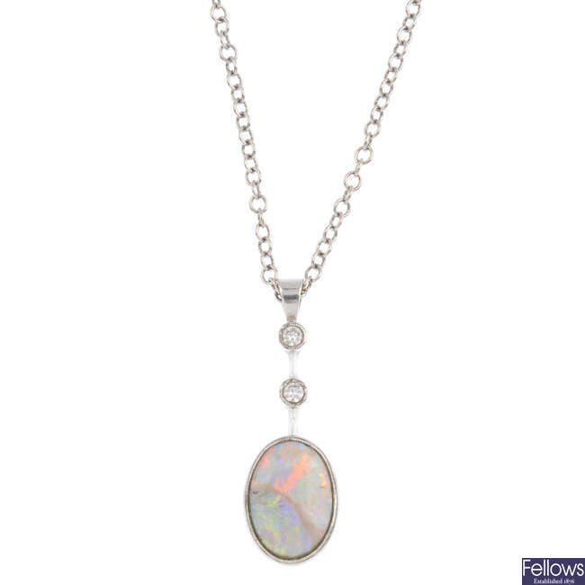 An opal and diamond pendant, with chain.